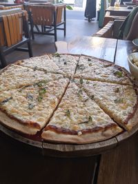 High angle view of pizza in plate on table