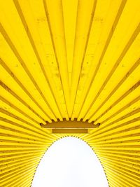 Low angle view of yellow ceiling