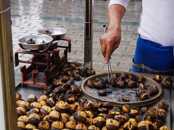 Man preparing food at street