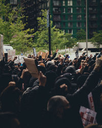 Group of people on street in city