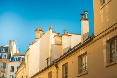 Low angle view of buildings against sky