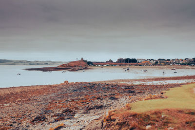 Scenic view of beach against sky