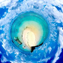 High angle view of blue water in sea against sky