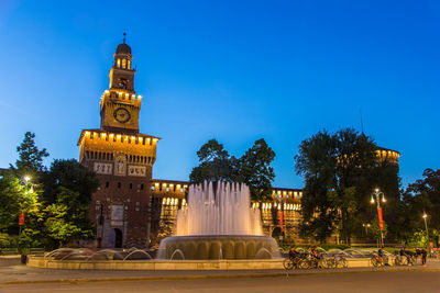 View of clock tower against blue sky