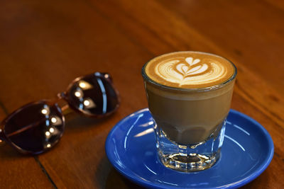 Close-up of coffee cup on table