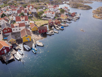 High angle view of townscape by sea