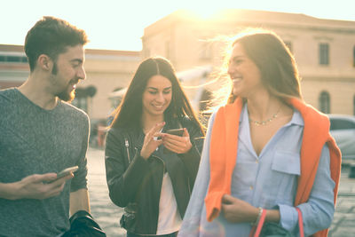 Young woman using mobile phone