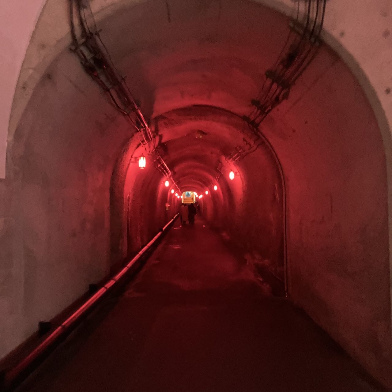 tunnel, architecture, infrastructure, red, arch, lighting equipment, the way forward, illuminated, indoors, transportation, diminishing perspective, subway, built structure, no people, darkness