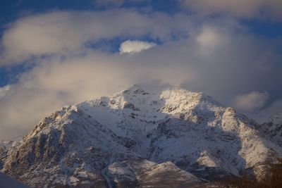 Majestic mountain with winter cloud cover