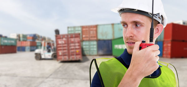 Portrait of young man using mobile phone