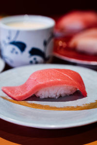 Close-up of fish in plate on table