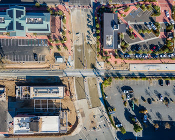 Aerial view of street amidst buildings in city