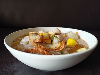 Close-up of food served on table