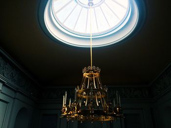 Close-up of chandelier hanging from cupola