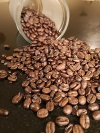 Close-up of coffee beans on table