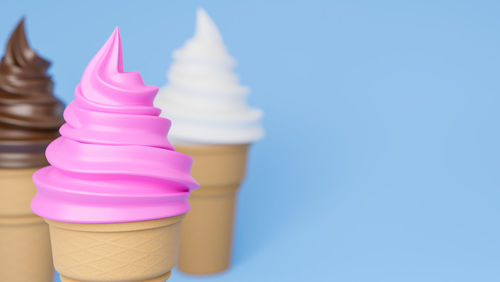 Close-up of ice cream against blue background