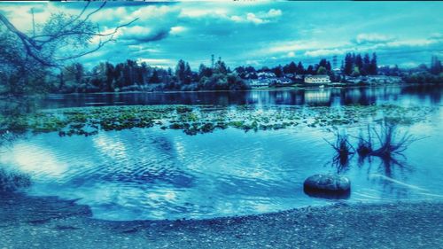 Scenic view of lake against sky