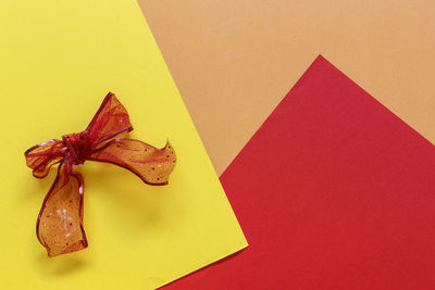 Close-up of christmas decoration on colored background