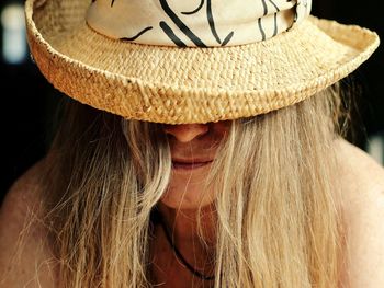 Close-up portrait of woman in hat