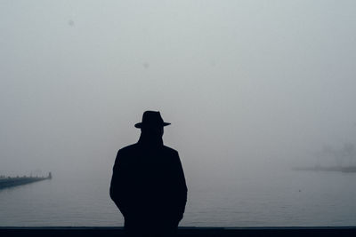 Shadow of man against wall