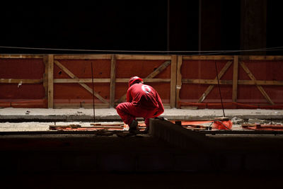 Man with red umbrella