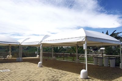 Built structure on beach against sky