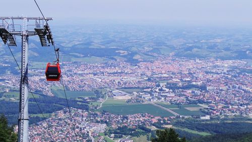 View of cityscape against cloudy sky from the pohorje hill, slovenia