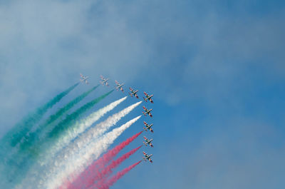 Low angle view of airshow in sky