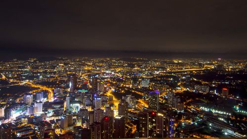 Aerial view of illuminated cityscape