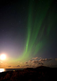 Scenic view of star field against sky at night