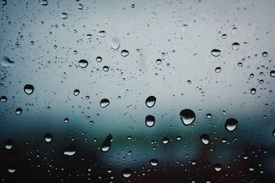 Close-up of water drops on glass