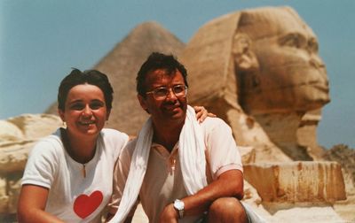 Smiling couple against the sphinx