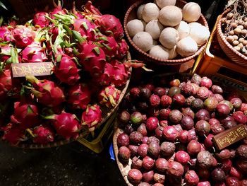 High angle view of strawberries in market for sale