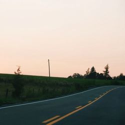 Empty road at sunset