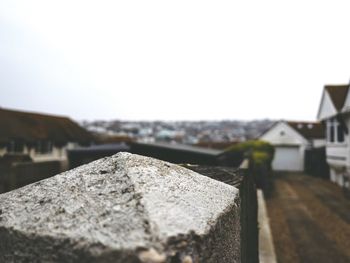 Close-up of stone roof against clear sky