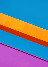 Low angle view of building against blue sky