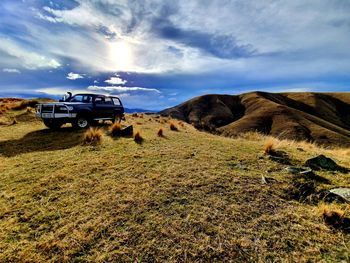 View of car on land against sky