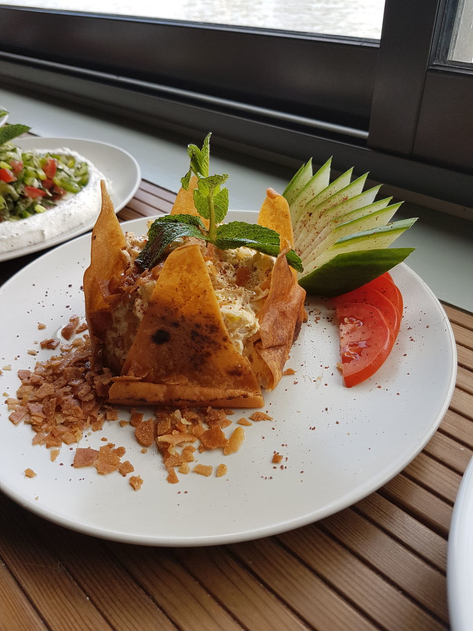 indoors, plate, food and drink, food, freshness, ready-to-eat, table, high angle view, still life, serving size, indulgence, directly above, close-up, flower, healthy eating, sweet food, leaf, no people, served, decoration