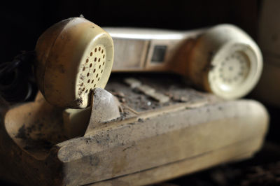 Close-up of abandoned telephone