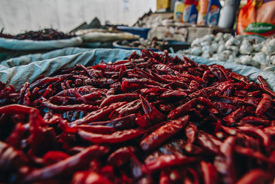 Close-up of red for sale at market stall