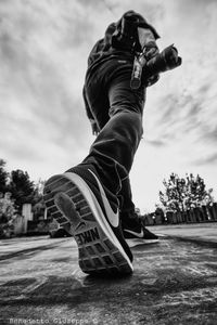 Low angle view of man against sky