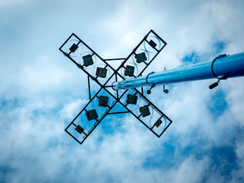 Low angle view of airplane against sky