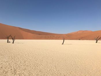 Scenic view of desert against clear sky
