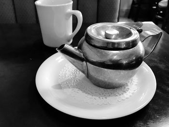 High angle view of coffee cup on table