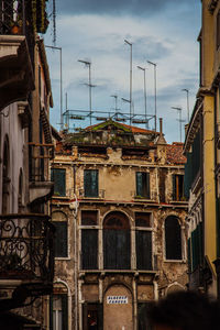 Low angle view of old building against sky