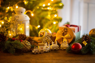 Illuminated christmas tree on table