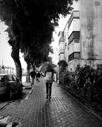Man walking on street in city