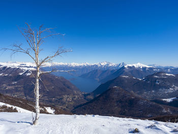 Winter landscape of lake como from valle intelvi alps