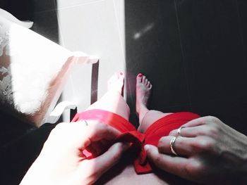 Cropped image of man holding hands