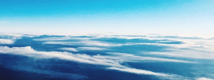 Aerial view of clouds over blue sky